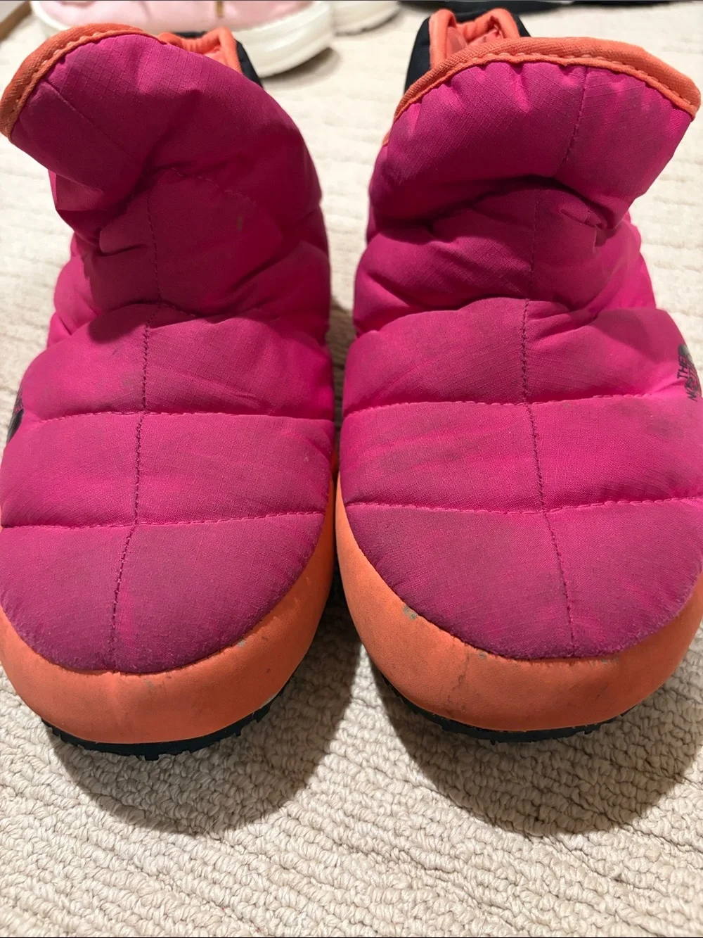 The North Face Kids Pink and Orange Puffy Slip-On Slippers